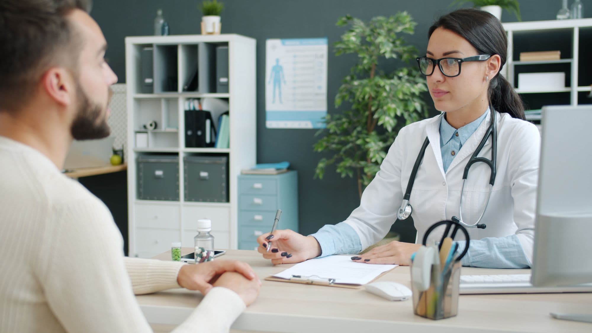A doctor consulting a patient at St. Joseph Hospital