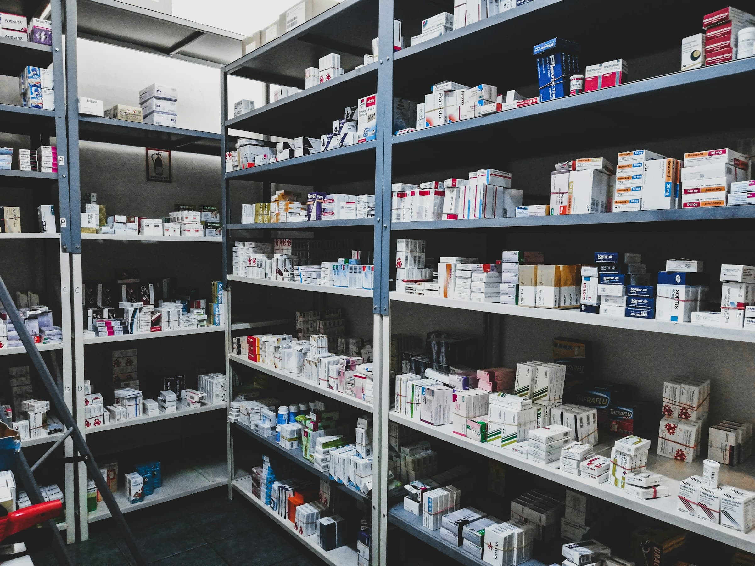 Shelves of stocked medicine in a hospital dispensary